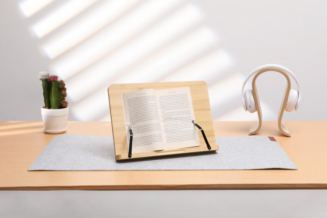 book stand and headphones on desk